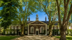 Museum of the Home in Hoxton featuring its historic building surrounded by mature trees and gardens.