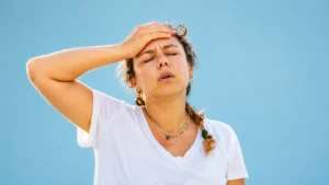 Woman experiencing discomfort linked to possible Foundayo side effects