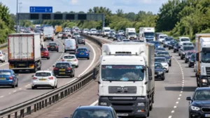 Heavy motorway traffic with lorries and cars in the UK